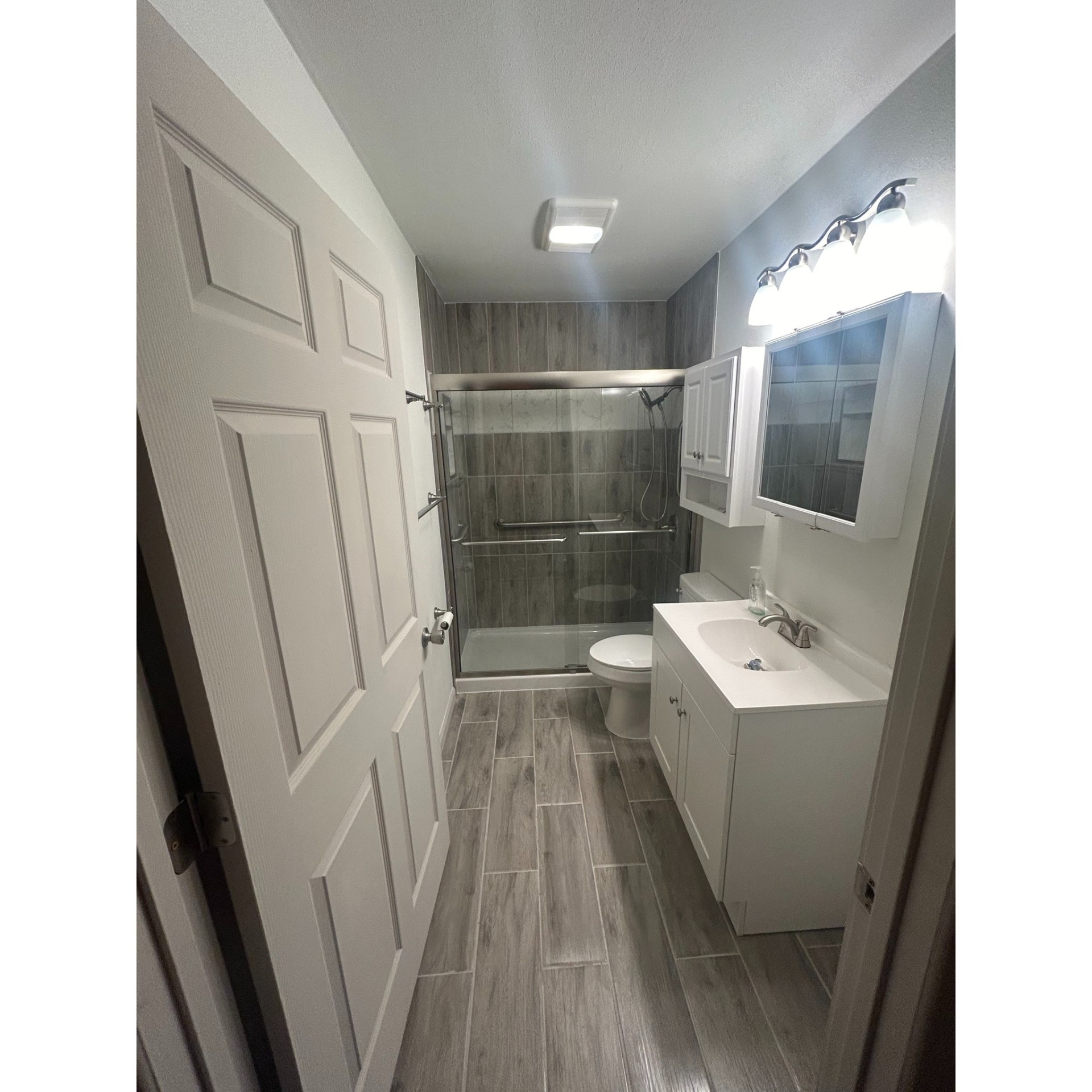 Spa inspired bathroom remodel by TMB Construction